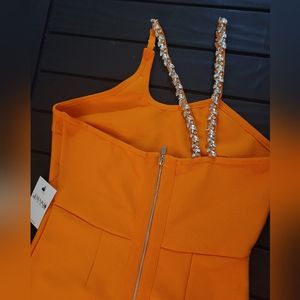 Beautiful Orange Bodycon dress, size large w/ crossbody straps with diamonds.